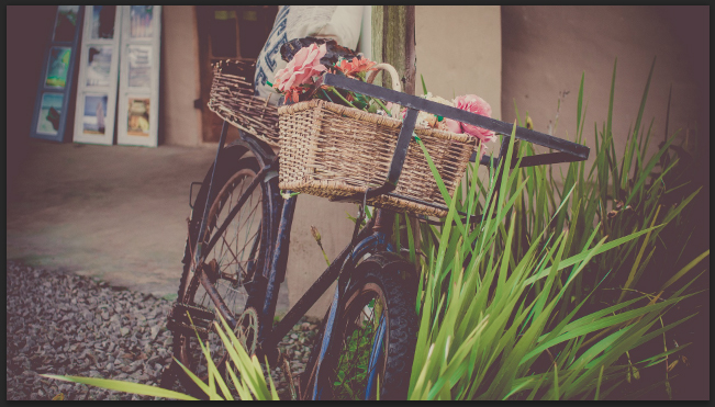 Rustic wooden crate with fresh wildflowers